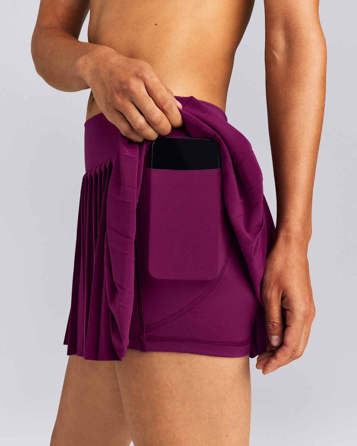 AirMove™ Pleated Skort with Pockets | Ripe Fig